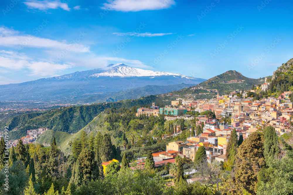 Awesome view of Taormina resorts and Etna volcano mount.