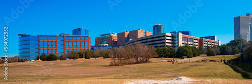 Fort Worth panoramic city skyline and building architecture over Trinity River Park in Texas, USA, modern cityscape with natural open space and trails