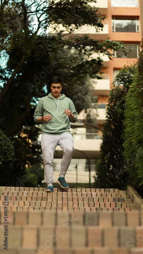 young sportsman exercising
athletes going down stairs
