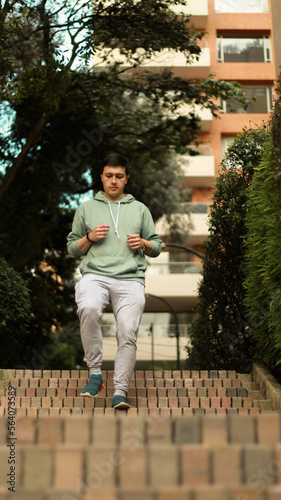 young sportsman exercising
athletes going down stairs

