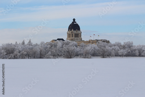 Saskatchewan Legislature building set in heavy frosted trees