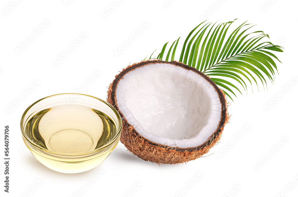 Glass bowl of coconut oil with half coconut and leaves on white background. Glass bowl of coconut oil with half coconut and leaves on white background.