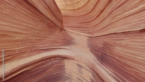 The Wave POV hiking footage of unique sandstone at Coyote Buttes wilderness Arizona Utah border USA. 