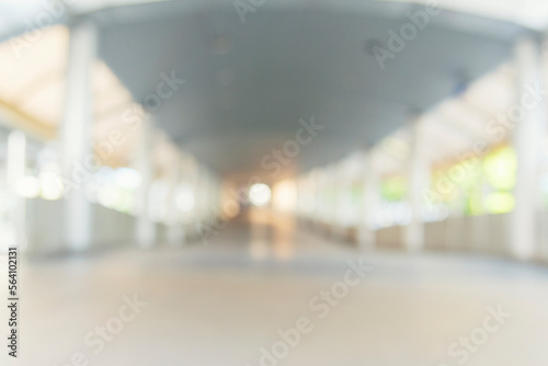 Blurred background bright shopping mall Silver gray lighting. defocused store light bokeh in retail store. Blurry hospital bright softness hotel with copy space. Backdrop present design template.