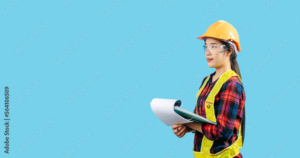 Young asian engineer female use pen to check list on clipboard posture Young asian engineer female use pen to check list on clipboard posture