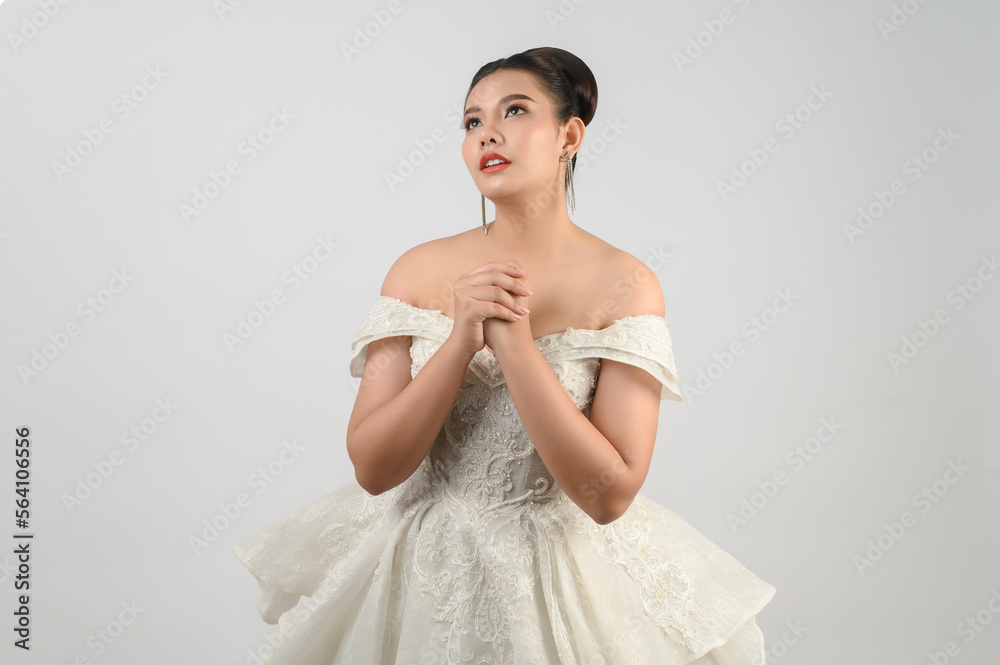 Young asian beautiful bride smiling with happy on white background Young asian beautiful bride smiling with happy on white background
