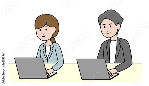 ノートパソコンを使っている男性と女性