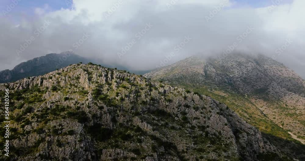 Beautiful rocky mountain landscape in summer, cloudy sky. Spain Beautiful rocky mountain landscape in summer, cloudy sky. Spain