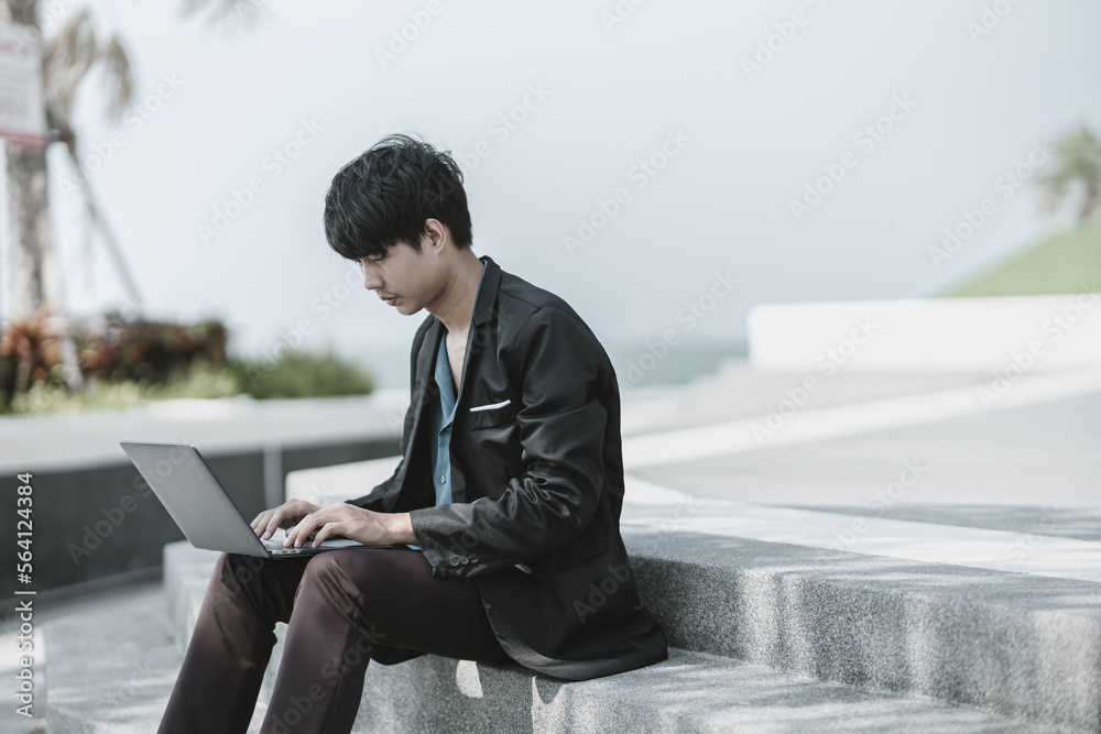 Employees fired or resigned from the company use laptop to find a job, schedule an interview..Unemployed, hiring job, quitting job concept. Employees fired or resigned from the company use laptop to find a job, schedule an interview..Unemployed, hiring job, quitting job concept.