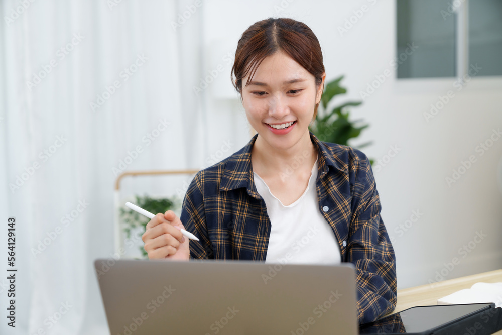 Happy asian woman speak conference on laptop in video call people smart working from home. Happy asian woman speak conference on laptop in video call people smart working from home.