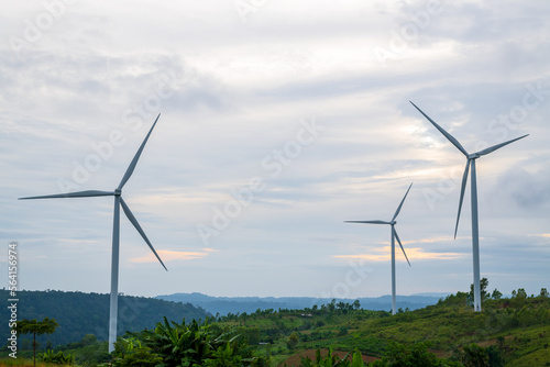 Beautiful renewable energy wind turbines on the mountain.