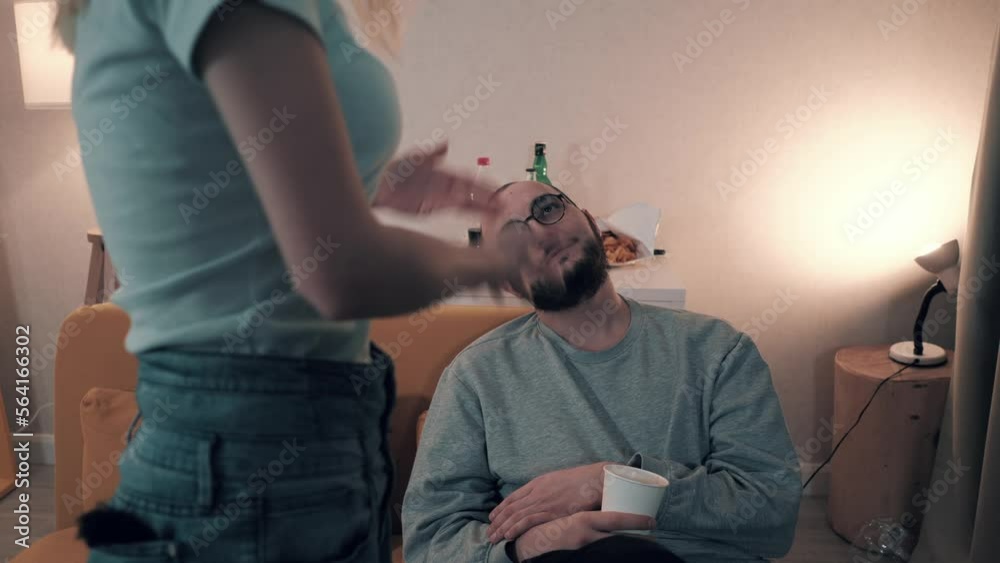 Young couple is arguing, girl screaming and scolding her husband