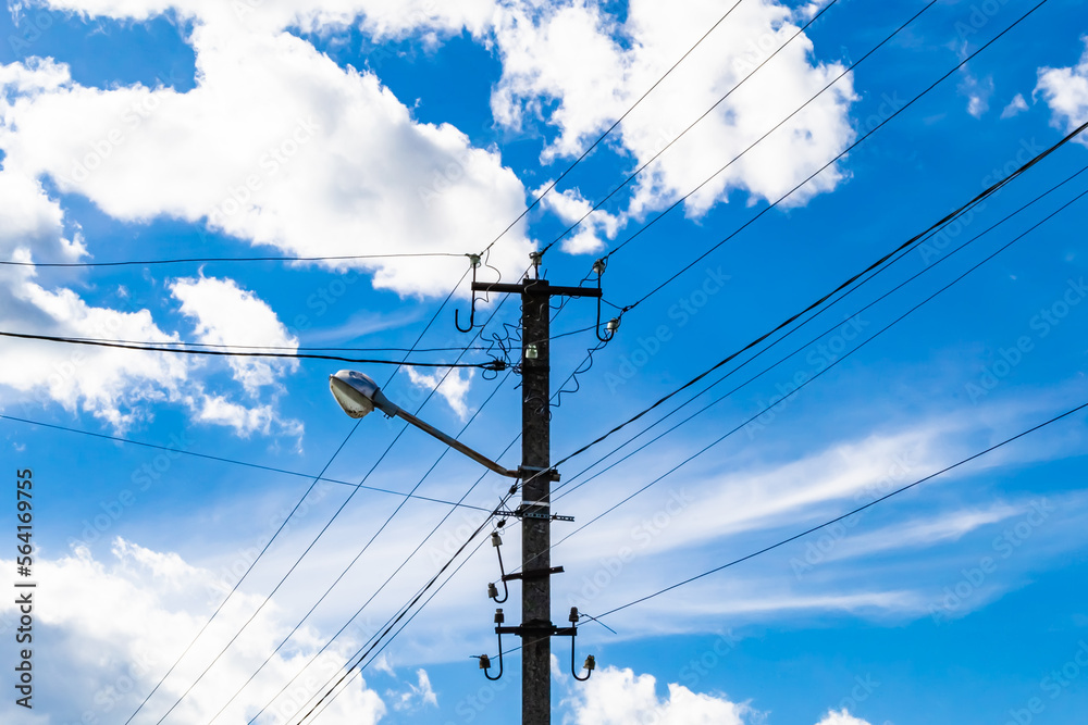 Power electric pole with line wire on colored background close up Power electric pole with line wire on colored background close up