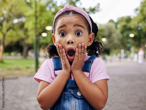 Fotografie Wow, surprise and girl child at park outdoors looking shocked