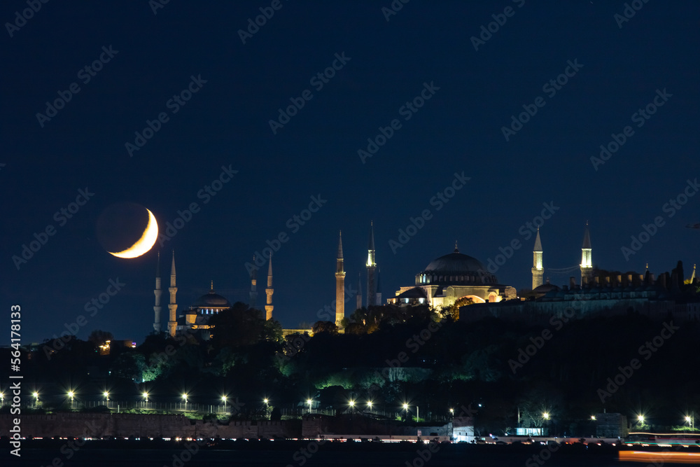Fototapeta premium Ramadan concept. Crescent moon with Ayasofya or Hagia Sophia and Blue Mosque