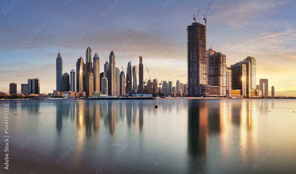 Fototapeta premium Dubai skyline Marina with reflecion at colorful sunset, UUEA