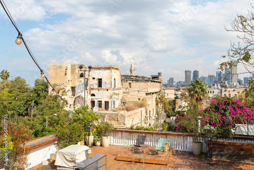 View from the balcony of the house on the adjacent old city of Yafo and the skyscrapers of Tel Aviv in the distance, in Tel Aviv - Yafo city, Israel