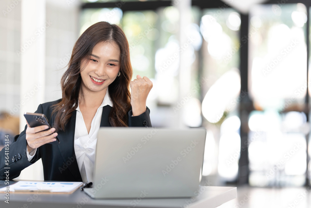 Beautiful asian woman using laptop computer, exciting and celebrating with good news of business successful. Small business startup concept. Beautiful asian woman using laptop computer, exciting and celebrating with good news of business successful. Small business startup concept.