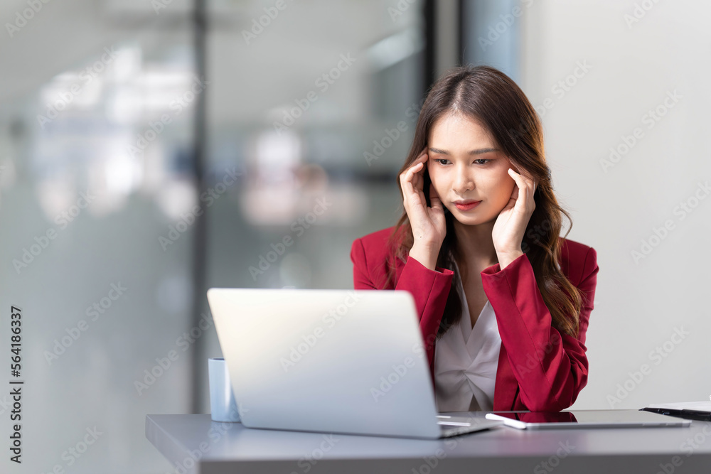 asian woman thinking hard concerned about online problem solution looking at laptop screen, worried serious asian businesswoman focused on solving difficult work computer task