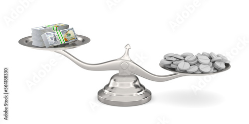 Money and tablet on scale. ...