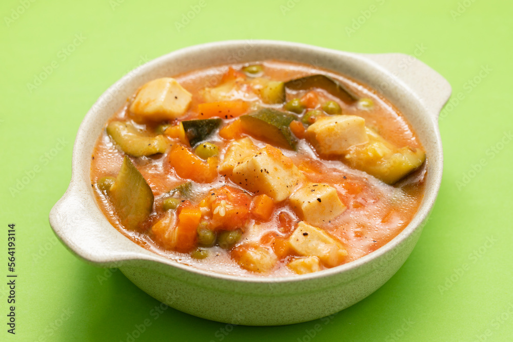 Delicious stew squid with vegetables in bowl Delicious stew squid with vegetables in bowl