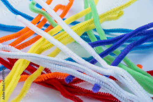 primary color selection of craft straight  pipe cleaners isolated on a white background photo