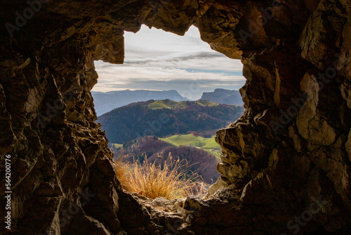 panoramic view of the mountains from the opening in the rock photo