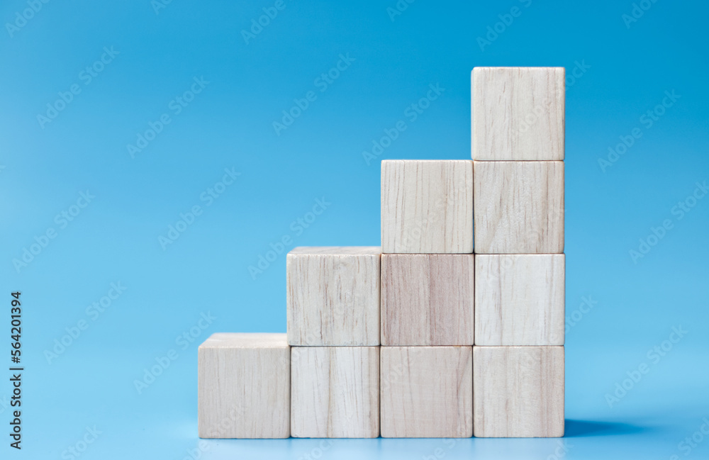 wood cube arrange in staircase shape ,business concept wood cube arrange in staircase shape ,business concept