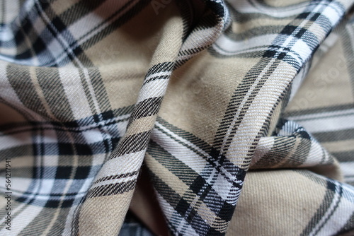 Jammed beige, black and white cotton flannel tartan fabric