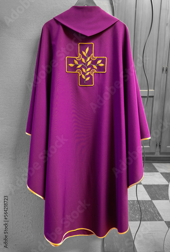 Purple chasuble of the priest inside the sacristy of a Catholic church