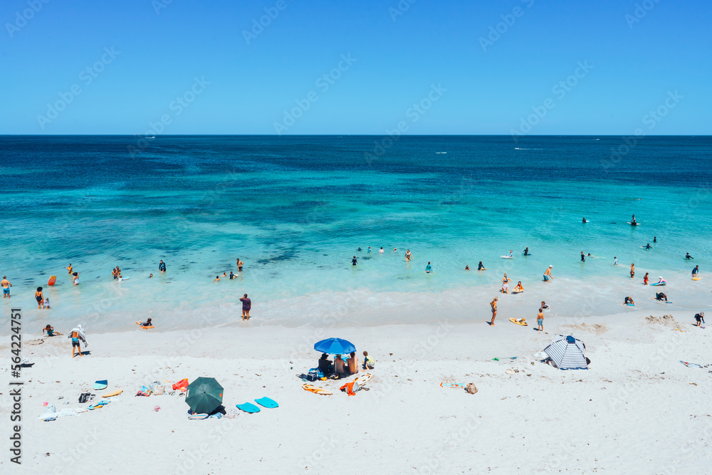 People enjoying a beach day at City Beach in Perth Western Australia People enjoying a beach day at City Beach in Perth Western Australia