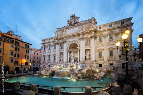 Amazing panoramic view with no people of famous Rome Trevi Fountain (Fontana di Trevi) in blue hour before sunrise, Rome, Italy.