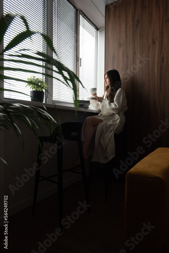 woman drinking coffee in the morning at home. Beautifull morning at cozy home