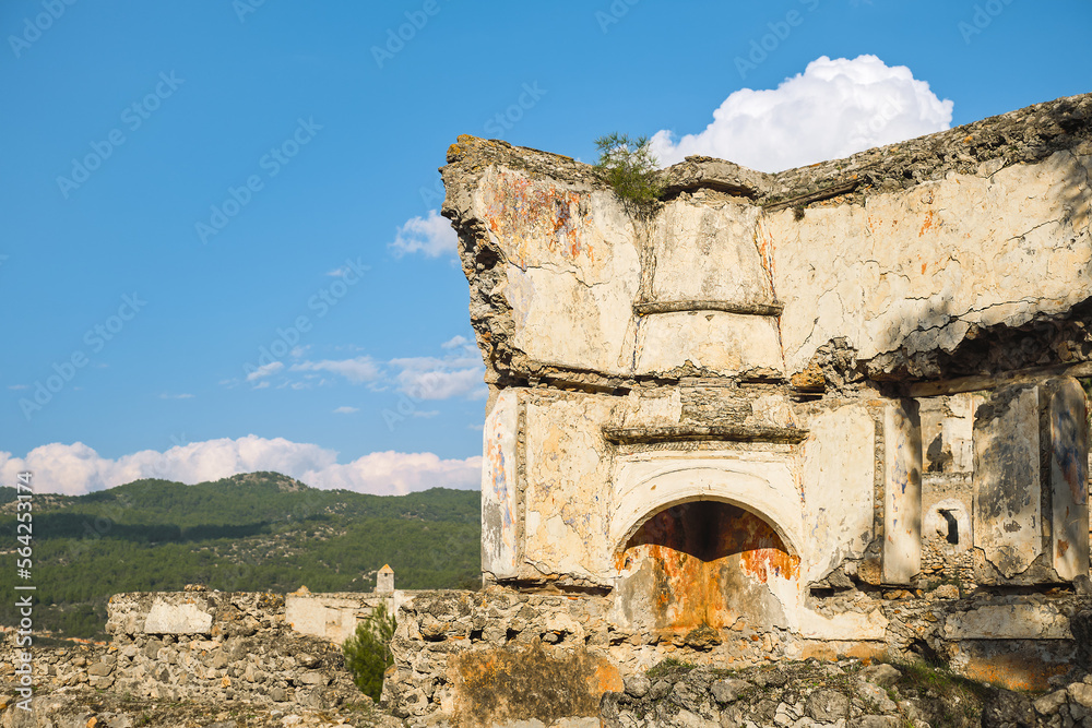 The ruins of a Greek house with the remains of a furnace in the Greek town of Karmilissos located near the village of Kayakoy, Fethiye - Turkey. Site of the ancient Greek city