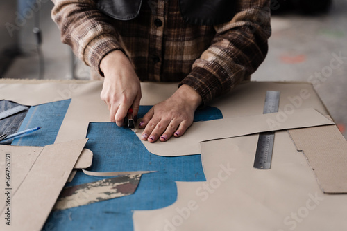 Fotografia, Obraz Process of cutting patterns to create products from genuine leather