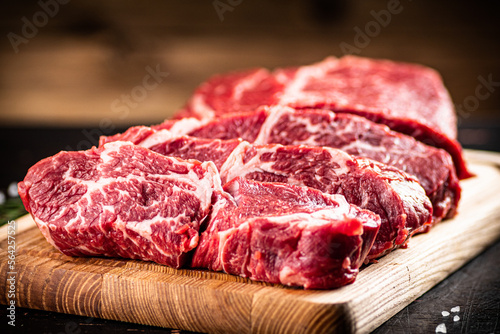 Chopped raw beef on a cutting board. 
