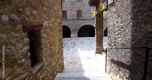 Stroll through the cobbled streets of a medieval village.Walking through the narrow and steep streets of BAGÁ, a small mountain town located in the Pyrenees of Catalonia, Spain. Personal perspective.
