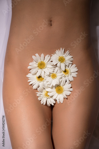 woman with flower. Fit body woman. Sensual. Sexy photo. Erotica. Sexual. 