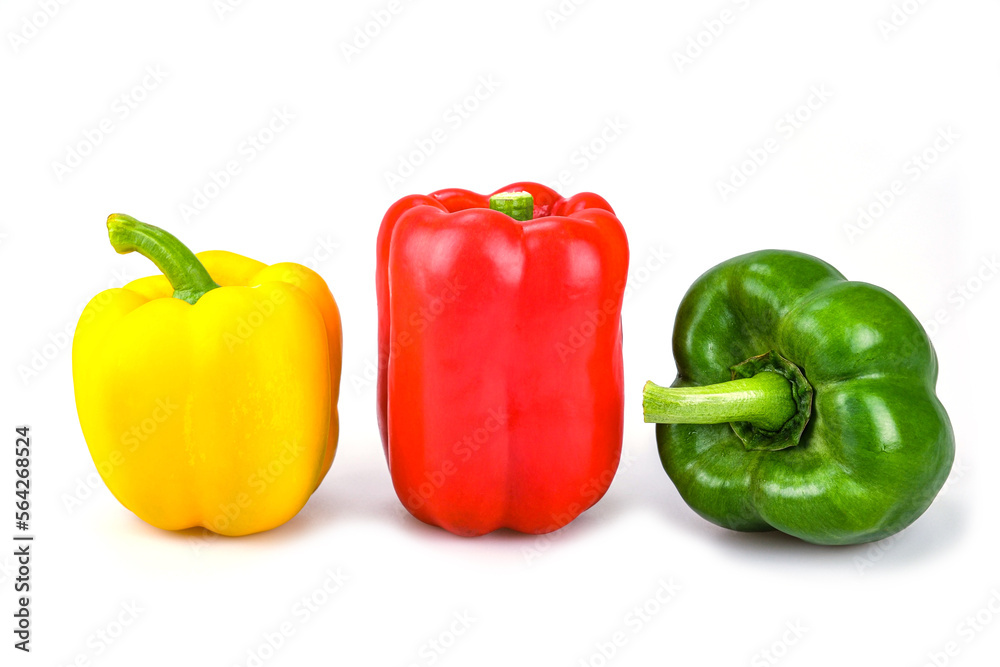 Red , green and yellow bell peppers isolated on white background Red , green and yellow bell peppers isolated on white background