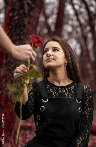 A beautiful girl getting roses for valentine's day photo