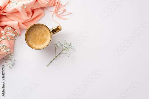 Hello spring concept. Top view photo of cup of hot frothy drinking pink scarf and gypsophila flowers on isolated white background with empty space