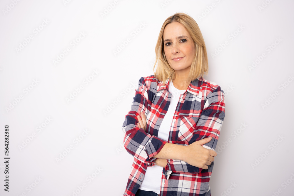 Photo of positive good mood lady wear plaid shirt arms folded smiling isolated white background Photo of positive good mood lady wear plaid shirt arms folded smiling isolated white background
