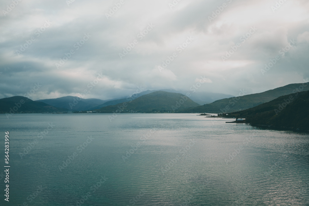 Majestic norwegian landscape with fjords and mountains on a beautiful day Majestic norwegian landscape with fjords and mountains on a beautiful day