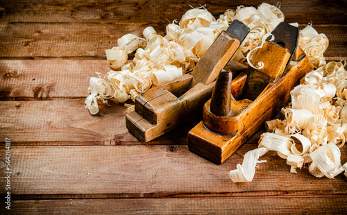 Hand planer with wooden sawdust. 