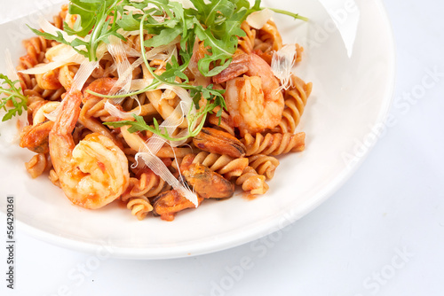 pasta with shrimps and salad