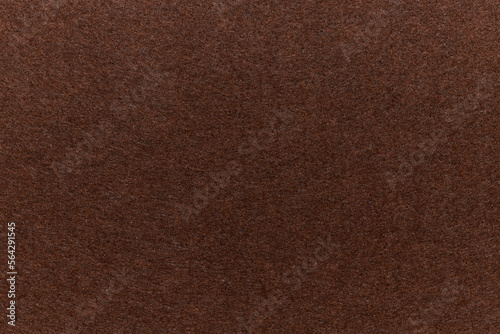 Soft felt textile material brown colors, colorful texture flap fabric background closeup