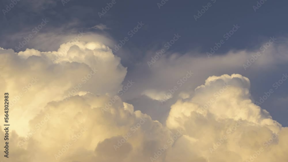 Fluffy thick clouds floating in blue sky Fluffy thick clouds floating in blue sky