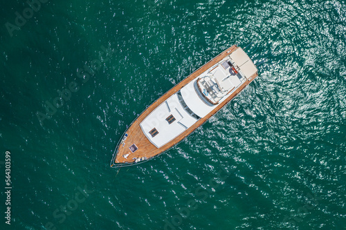 Above view at exclusive yacht docked on crystal water. © cegli
