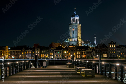 The city Deventer in the Netherlands by night with the Lebuinus church