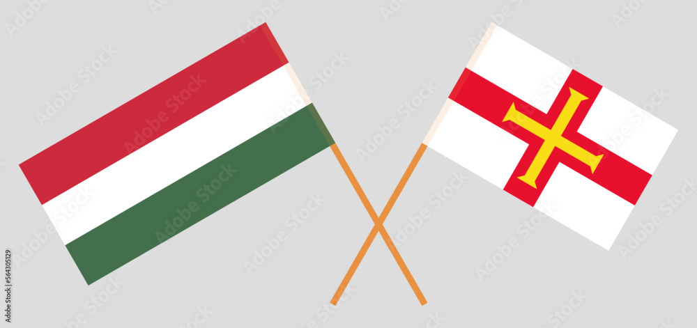 Crossed flags of Hungary and Bailiwick of Guernsey. Official colors. Correct proportion